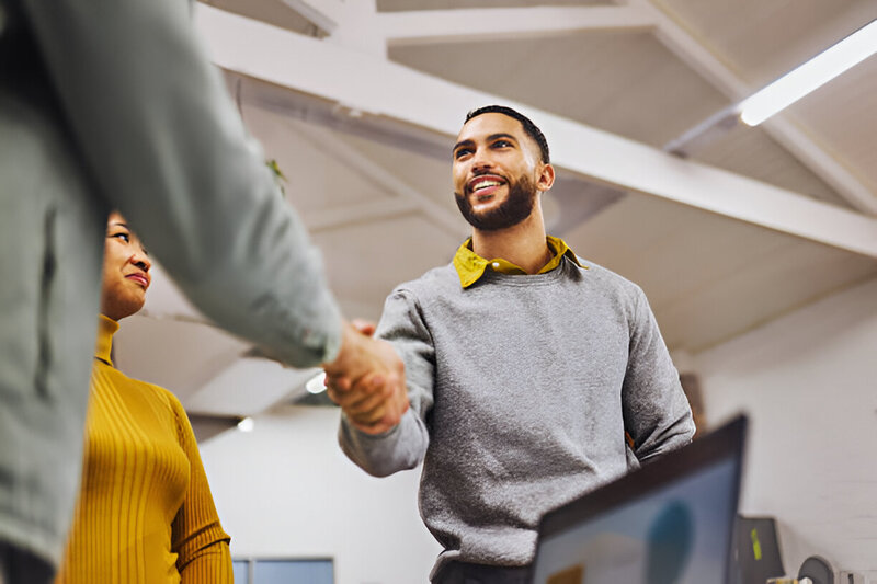 A team collaborating around a table in a modern office